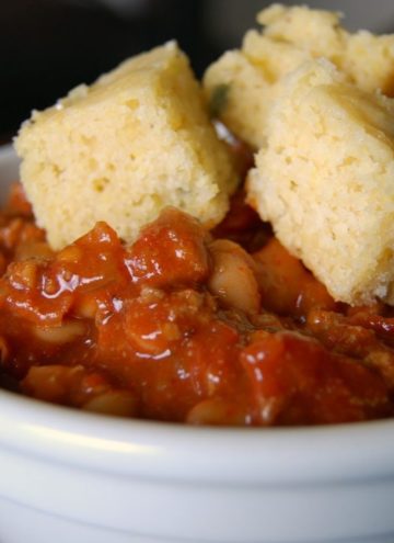 turkey chili topped with cornbread, on a bowl