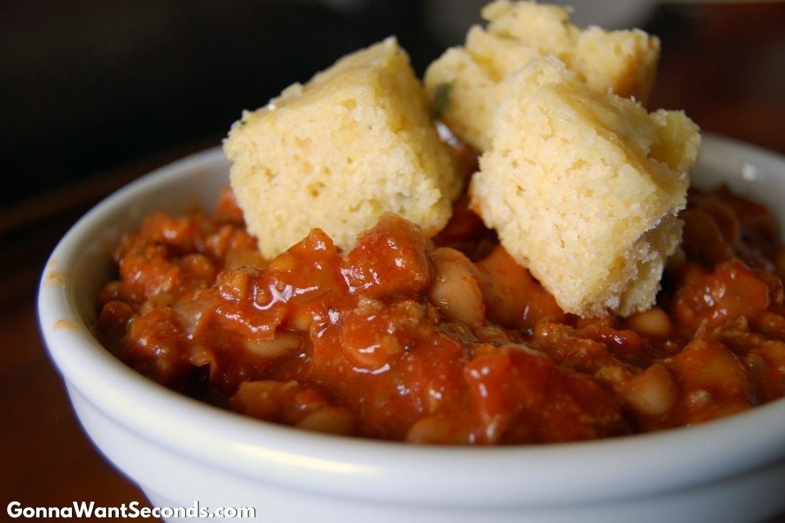 turkey chili topped with cornbread, on a bowl