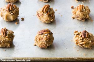 How to make Butter Pecan Cookies, prebaked cookies on a baking pan