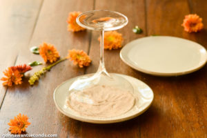 How to make Pumpkin pie martini, dipping the martini glass in sugar