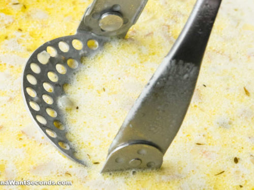 How to make Crockpot Potato Soup, mashing the potatoes