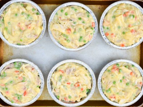 How to make KFC chicken pot pie, scooping mixture into individual pie pans