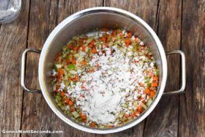 How to make Lemon Chicken Soup, sprinkling flour to sauteed veggies