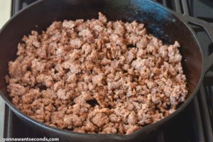 How to make Rotel Dip, cooking pork sausage