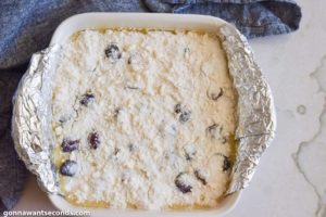 How to make Cherry Custard Pie Bars, topping cherries with reserved crumb mixture