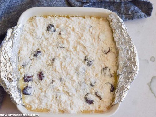 How to make Cherry Custard Pie Bars, topping cherries with reserved crumb mixture