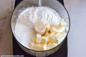 How to make Cherry Custard Pie Bars, pulsing the crumb ingredients in the food processor