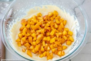 How to make Peach Bread, folding the peaches