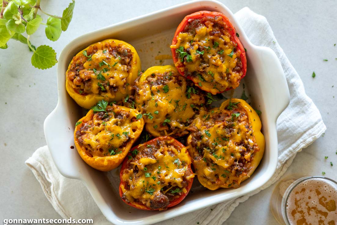stuffed peppers topped with melted cheese, top shot