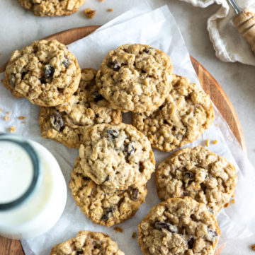 oatmeal raisin cookies with glass of milk, top view