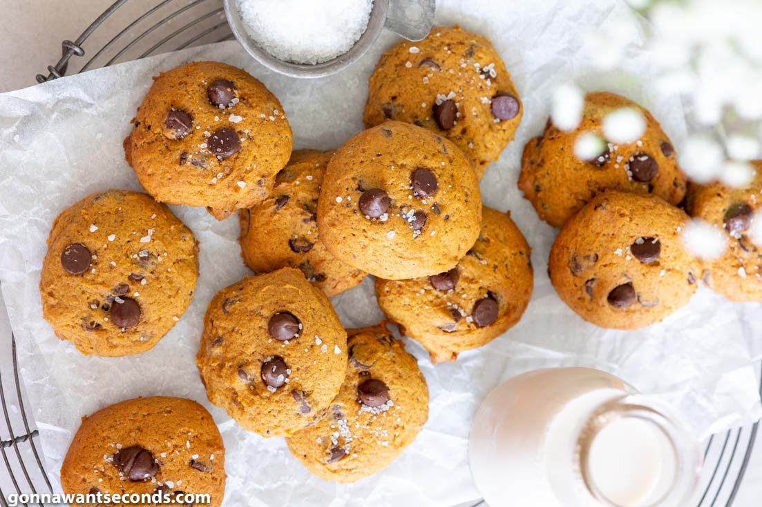 pumpkin chocolate chip cookies with milk on the side, top shot