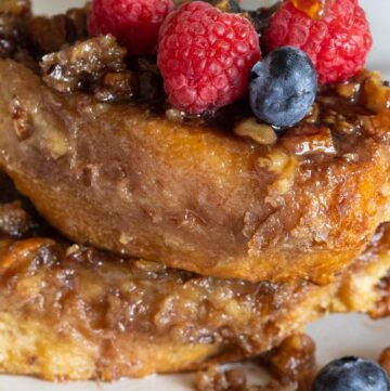 praline french toast topped with fresh berries