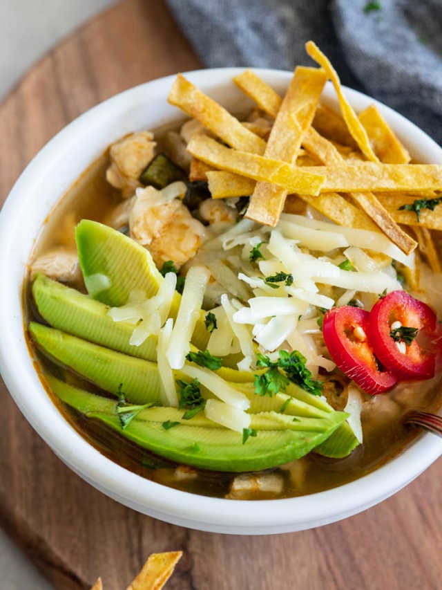 tortilla soup with chicken, avocado and tortilla strips