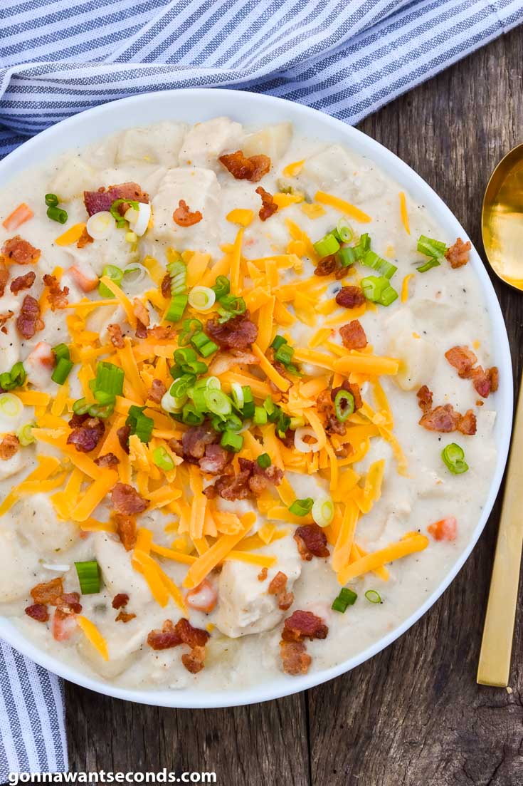 creamy chicken potato soup, topped with cheese and bacon
