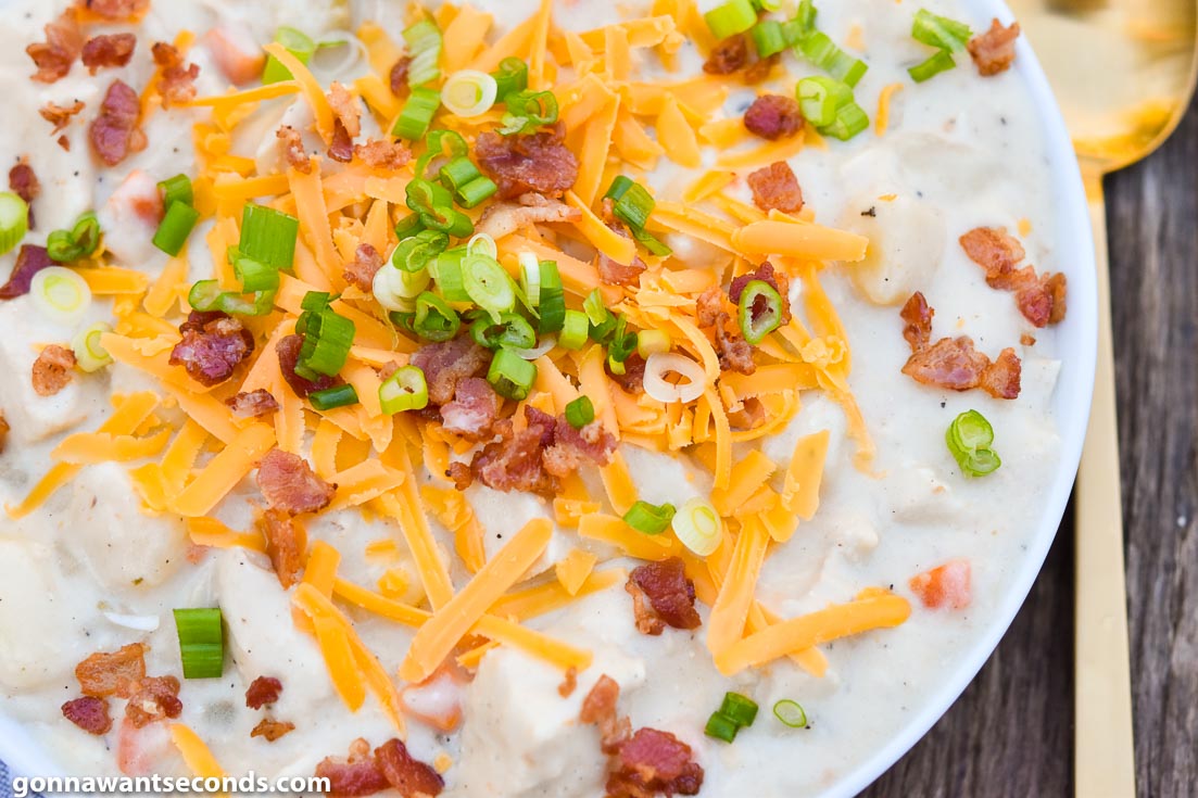 chicken and potato soup, topped with cheese and bacon