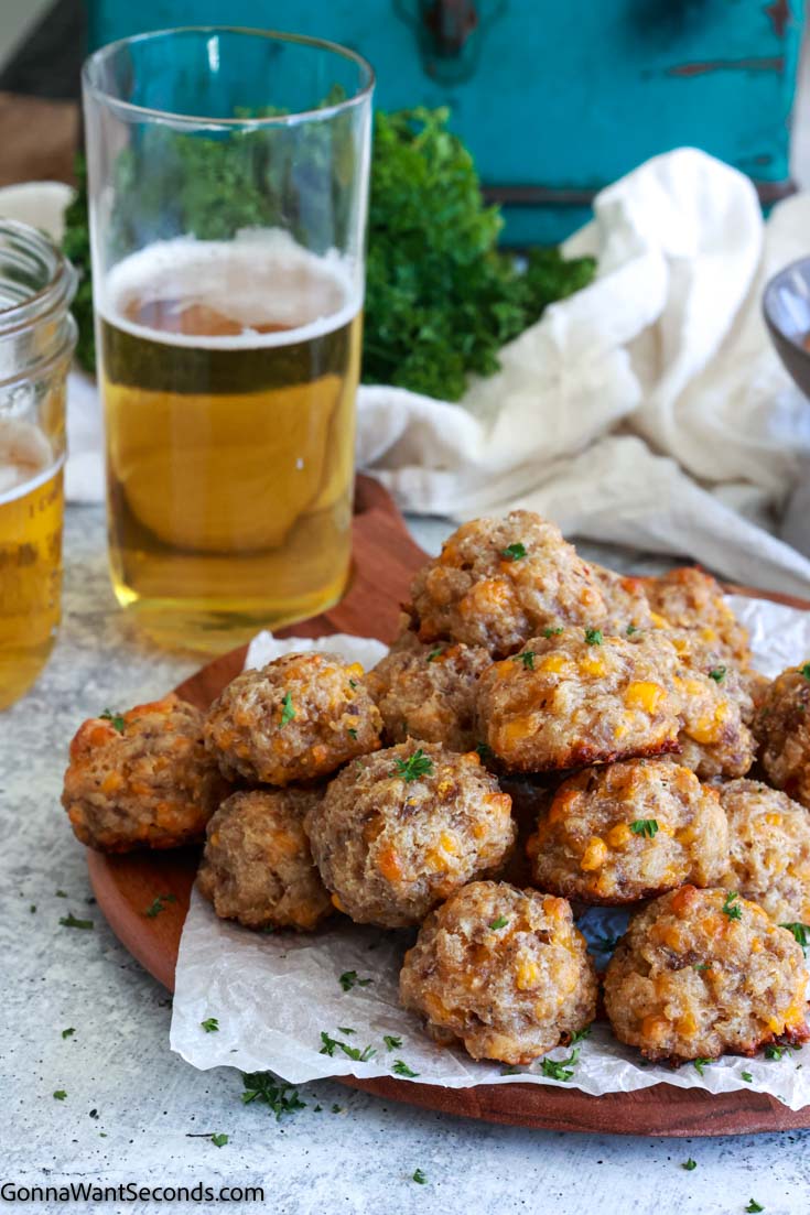sausage balls with cream cheese on a wooden board 
