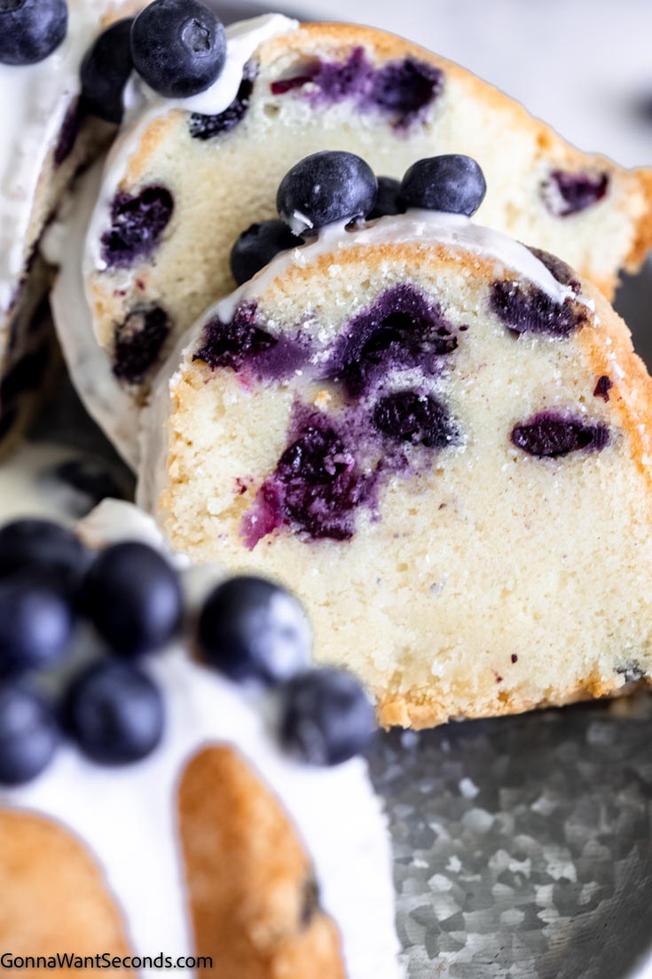close up slices of blueberry pound cake with sour cream 