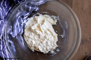 how to make million dollar dip with cream cheese, mix mayo and cream cheese