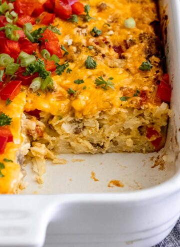 Pioneer Woman breakfast casserole topped with tomatoes