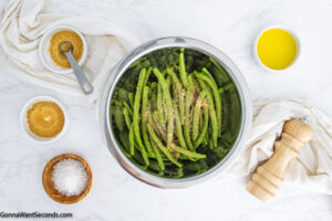 how to make air fryer green bean fries , add oil and seasonings