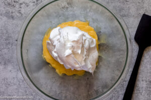 How to make cool whip icing, add the Cool Whip to the pudding mixture