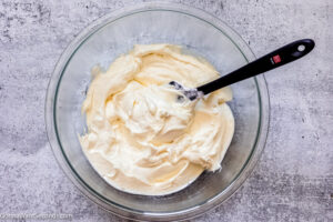 How to make whipped cream frosting, fold in the Cool Whip