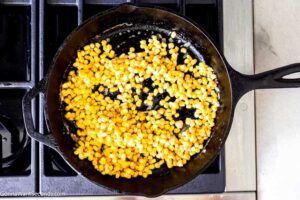 Step 3 how to make honey butter skillet corn with cream cheese, Stir in the honey, salt & pepper, nutmeg, and corn. Saute for 5 minutes.