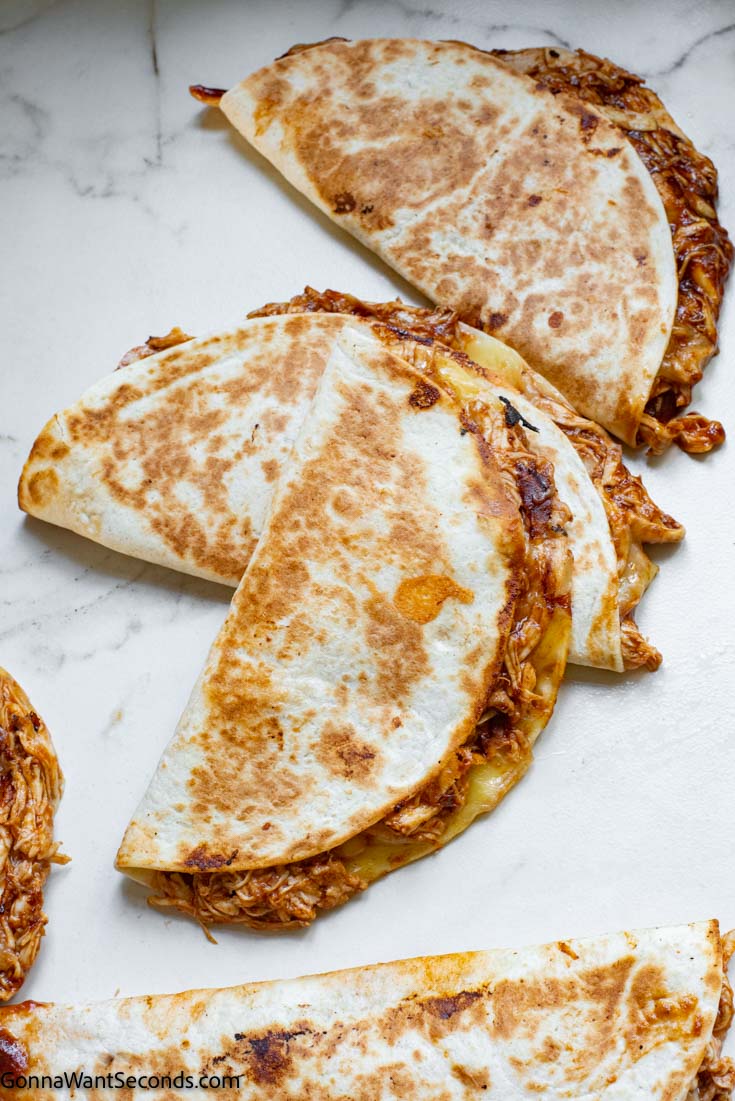 chicken quesadilla with bbq sauce on a plate 