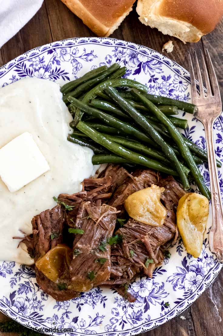 instant pot mississippi pot roast with green beans and mashed potatoes on a plate 