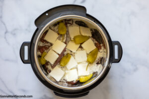 how to make mississippi pot roast recipe instant pot , adding butter and pepperoncini