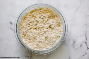 how to make hot cheesy mexican corn dip , add corn and other ingredients