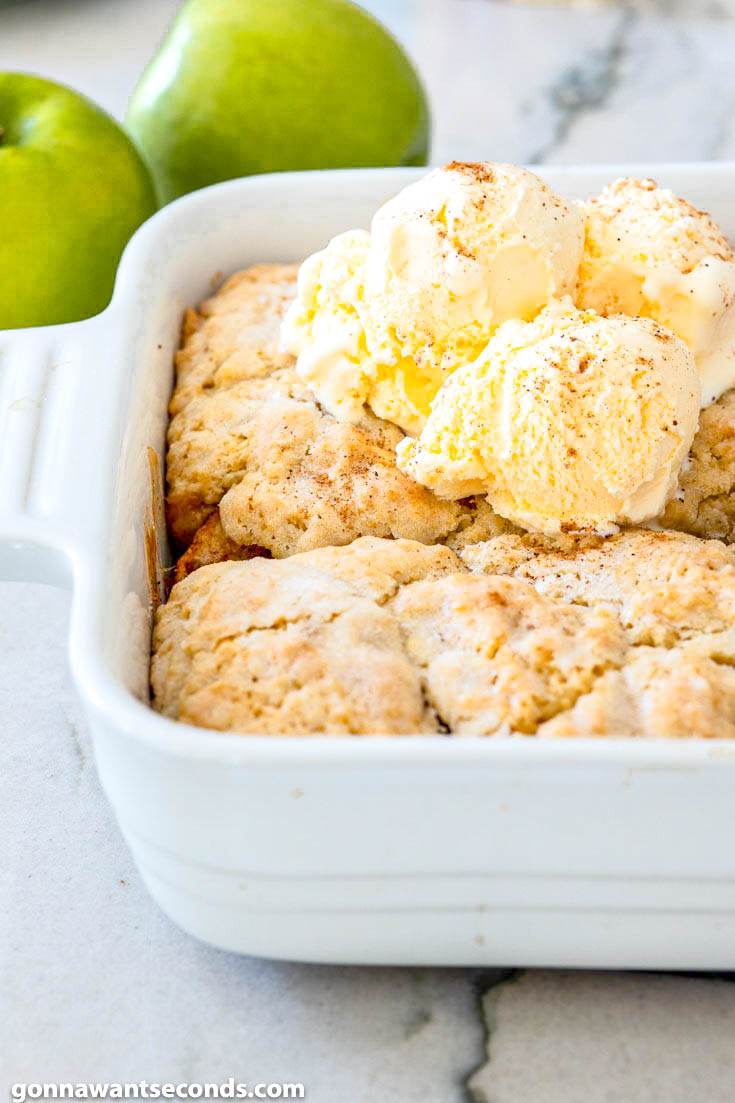 This old fashion apple cobbler is filled with tender, juicy apples and topped with a to-die-for, fluffy cake-like topping. It's the perfect fall dessert. #applerecipes #cobblerrecipes