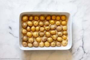 how to make parmesan crusted potatoes , arrange potatoes