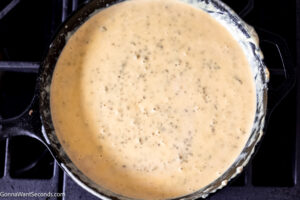 how to make cowboy queso dip , melt the cheese