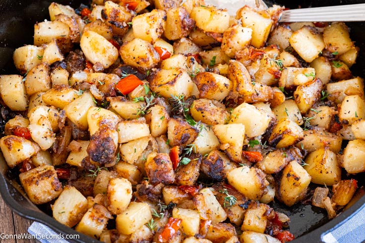 country potatoes and onions in a skillet