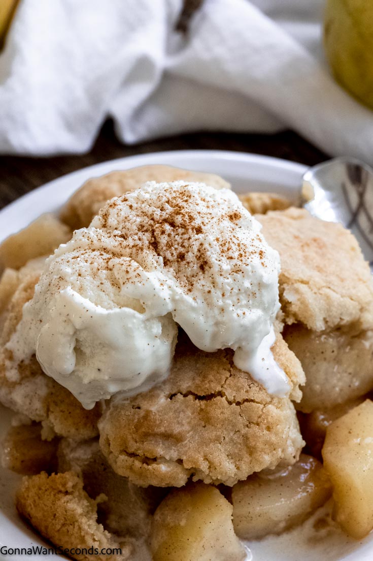southern pear cobbler with vanilla ice cream on top