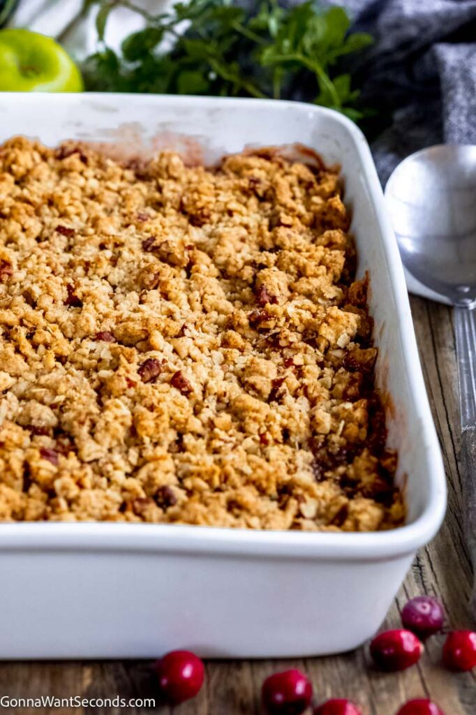 healthy apple cranberry crisp in a baking dish
