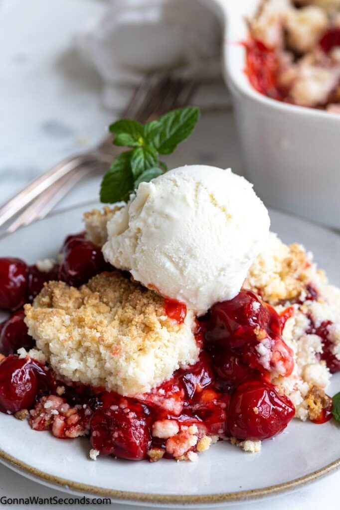 cherry cobbler with cake mix topped with vanilla ice cream