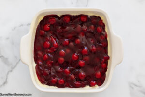 how to make cherry cobbler with cake mix , spread cherry pie filling