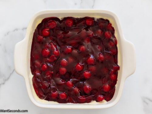 how to make cherry cobbler with cake mix , spread cherry pie filling