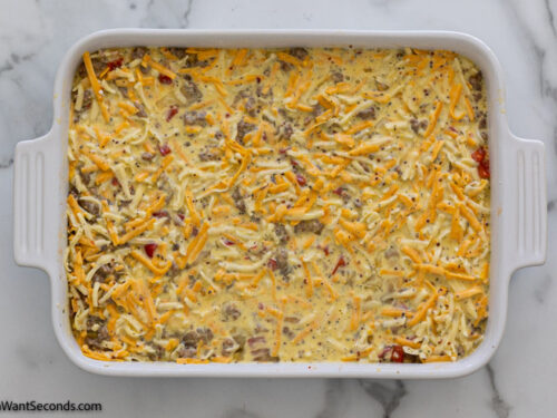 How to make breakfast casserole with hash browns and sausage , adding the remaining cheese