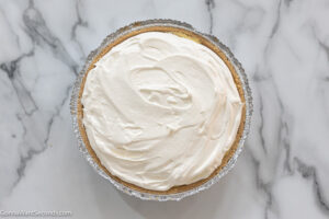 how to make eggnog pie with pudding , add whipped topping on top