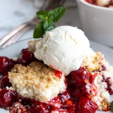 cherry cobbler with cake mix topped with vanilla ice cream