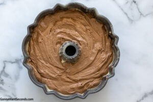 how to make old fashioned chocolate pound cake, Pour batter into prepared bundt pan. bake