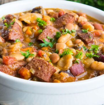 sausage and bean soup in a bowl