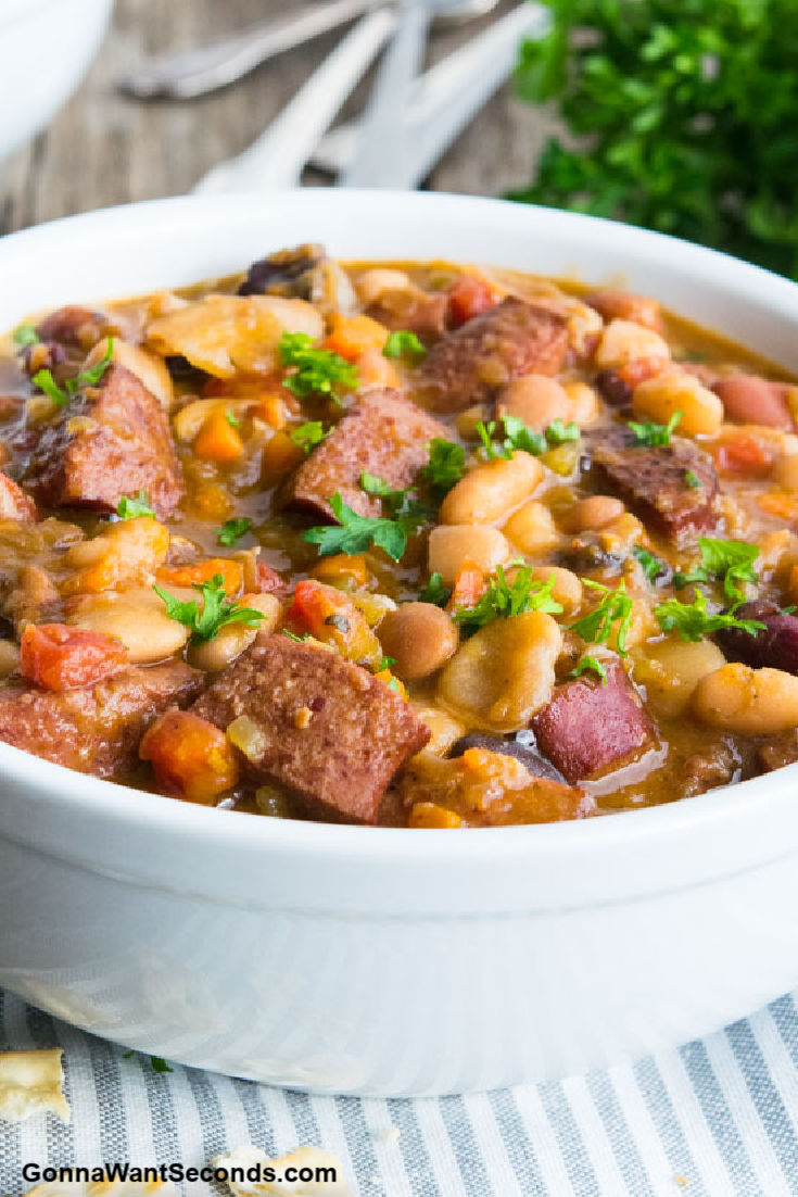 sausage and bean soup in a bowl