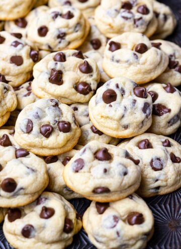 a pile of soft chocolate chip cookies