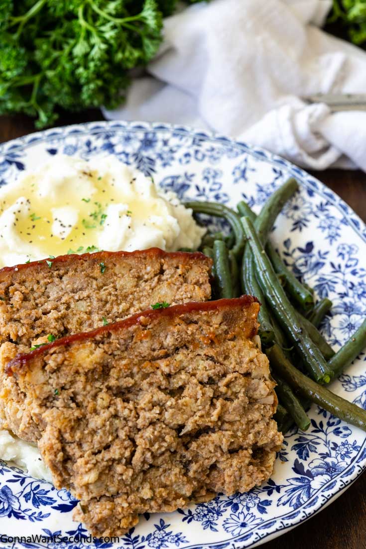 stove top stuffing meatloaf mix on a plate with mashed potatoes and green beans