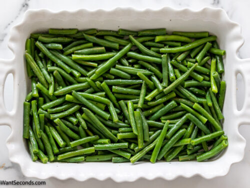 how to make bacon and brown sugar arkansas green beans , transfer green beans in the casserole dish