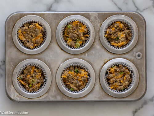 how to make cheesy sausage muffins , transfer the mixture in the muffin pan and bake